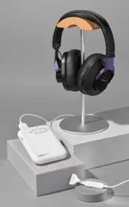 The Lenire tinnitus treatment device — headphones and tongue tip mouthpiece